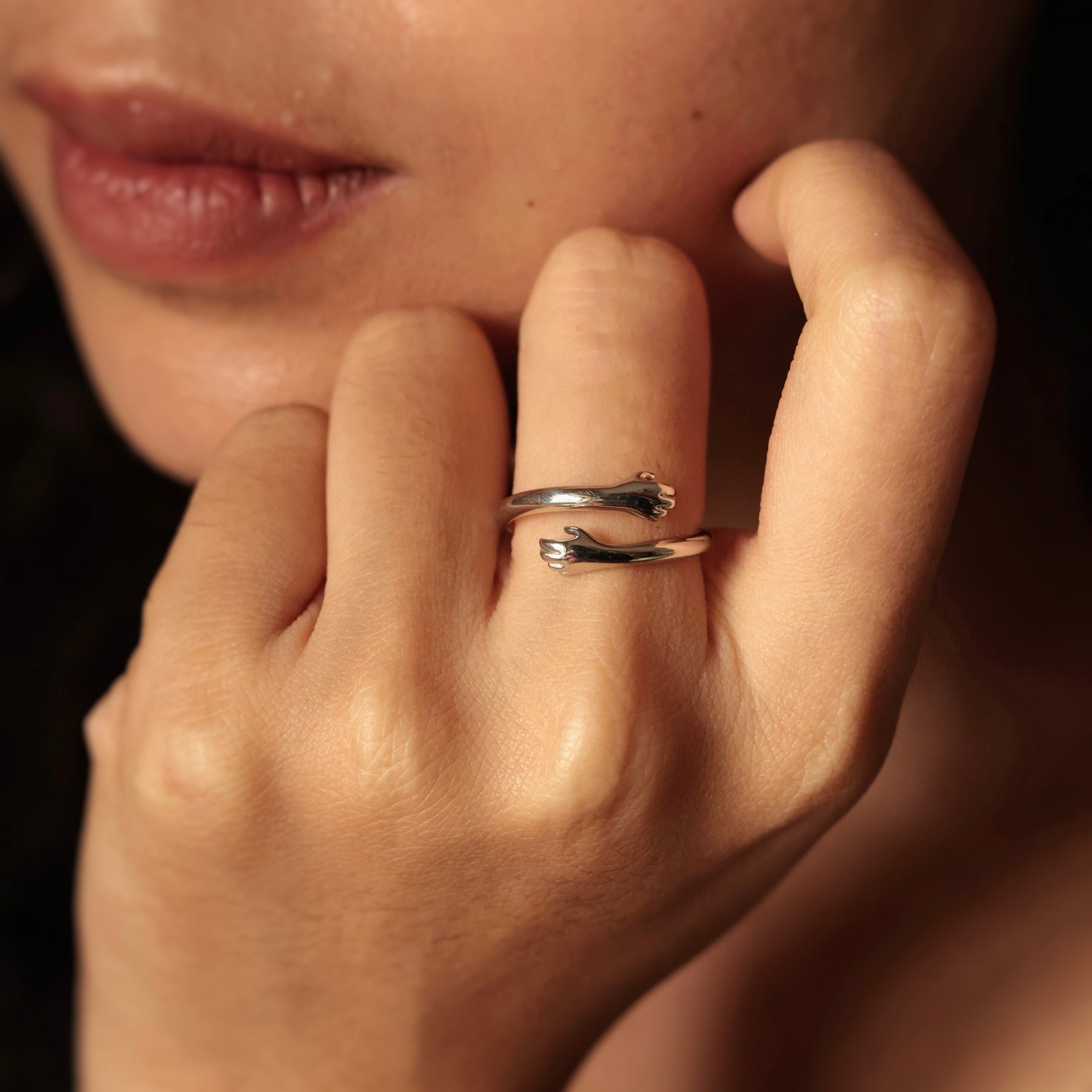 Premium Photo | Woman hand with beautiful thin silver rings
